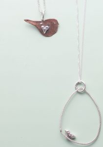 Copper Bird And Silver Hoop Necklaces With Bird In A Cage ring