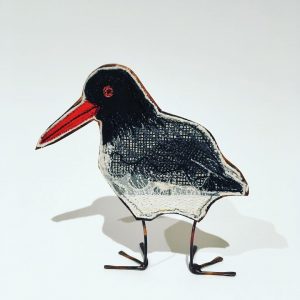 Embroidered oystercatcher with copper body