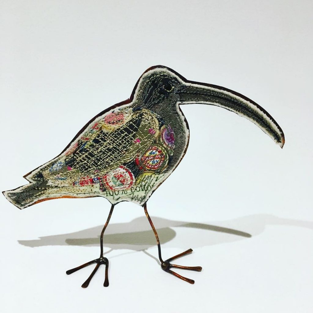 Embroidered curlew with copper body